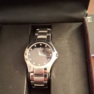 Movado Dark Face Stainless Steel Wristwatch